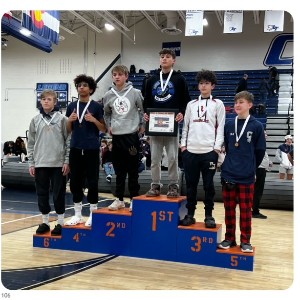 Wrestlers on podium 4